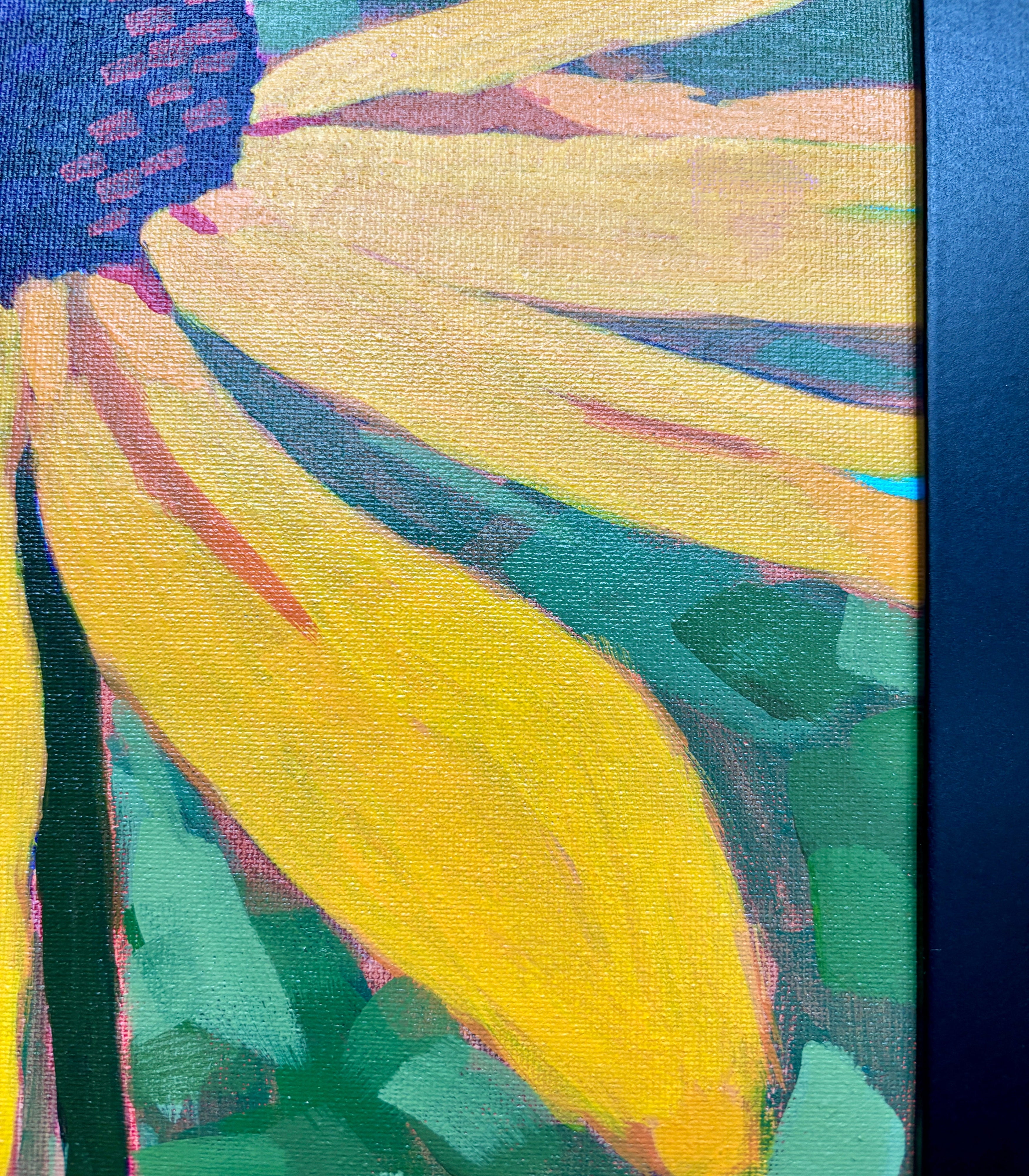Close-up of a painting with yellow and green abstract pattern