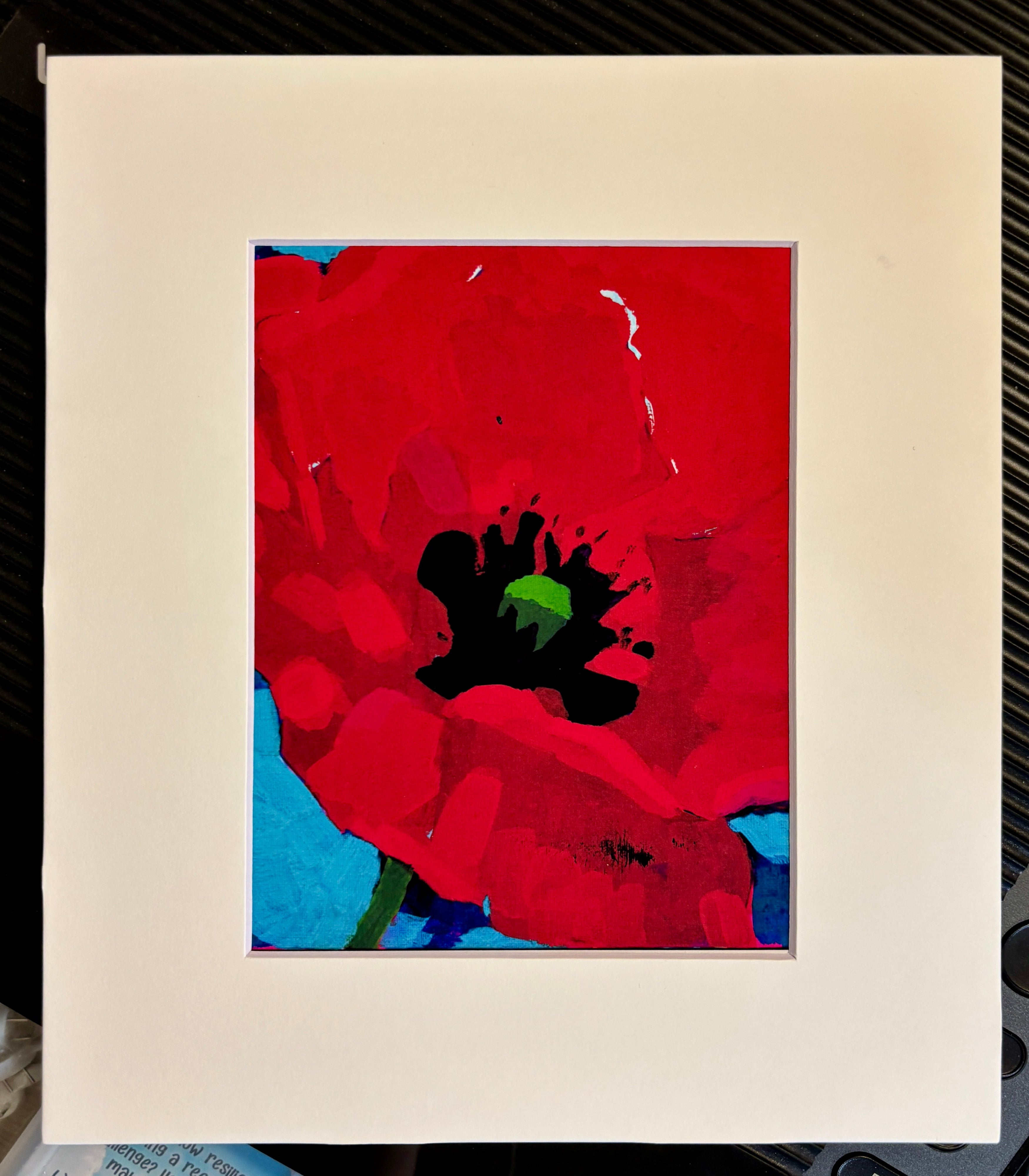 Abstract artwork with red, black, and blue colors on a white background