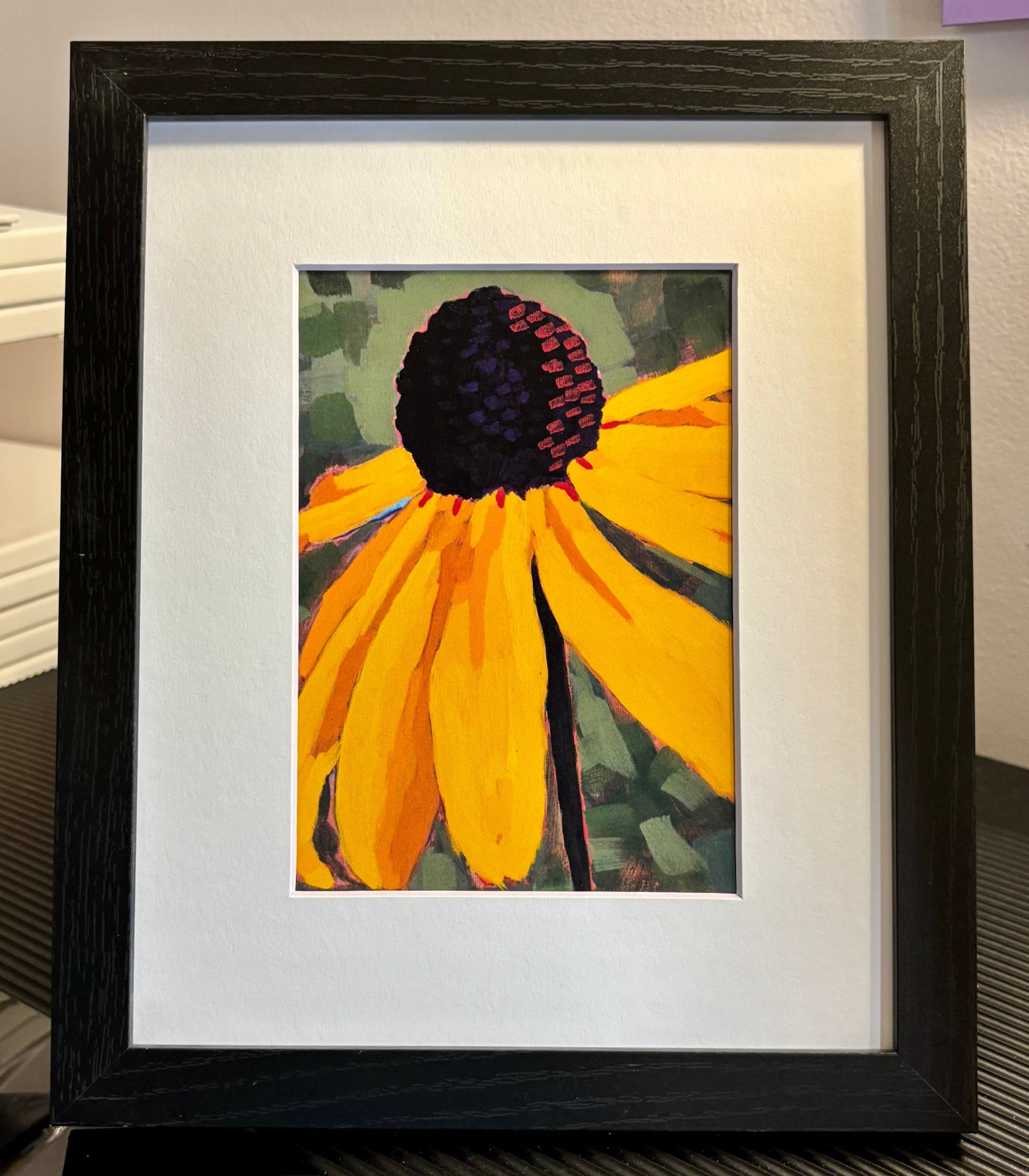 Framed artwork of a black-eyed Susan